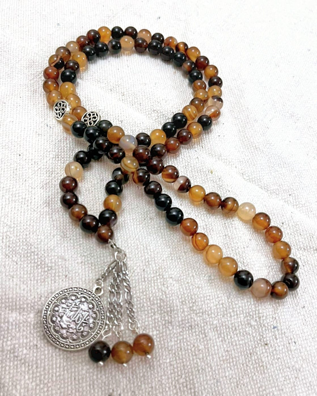 Agate stone and silver metals 99 prayer beads.